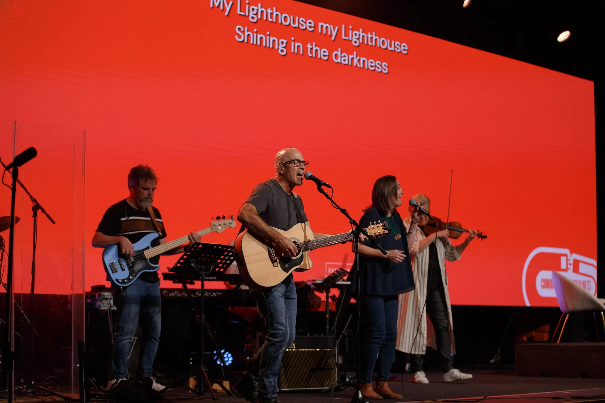 The band and leading KEC 2024 evening session