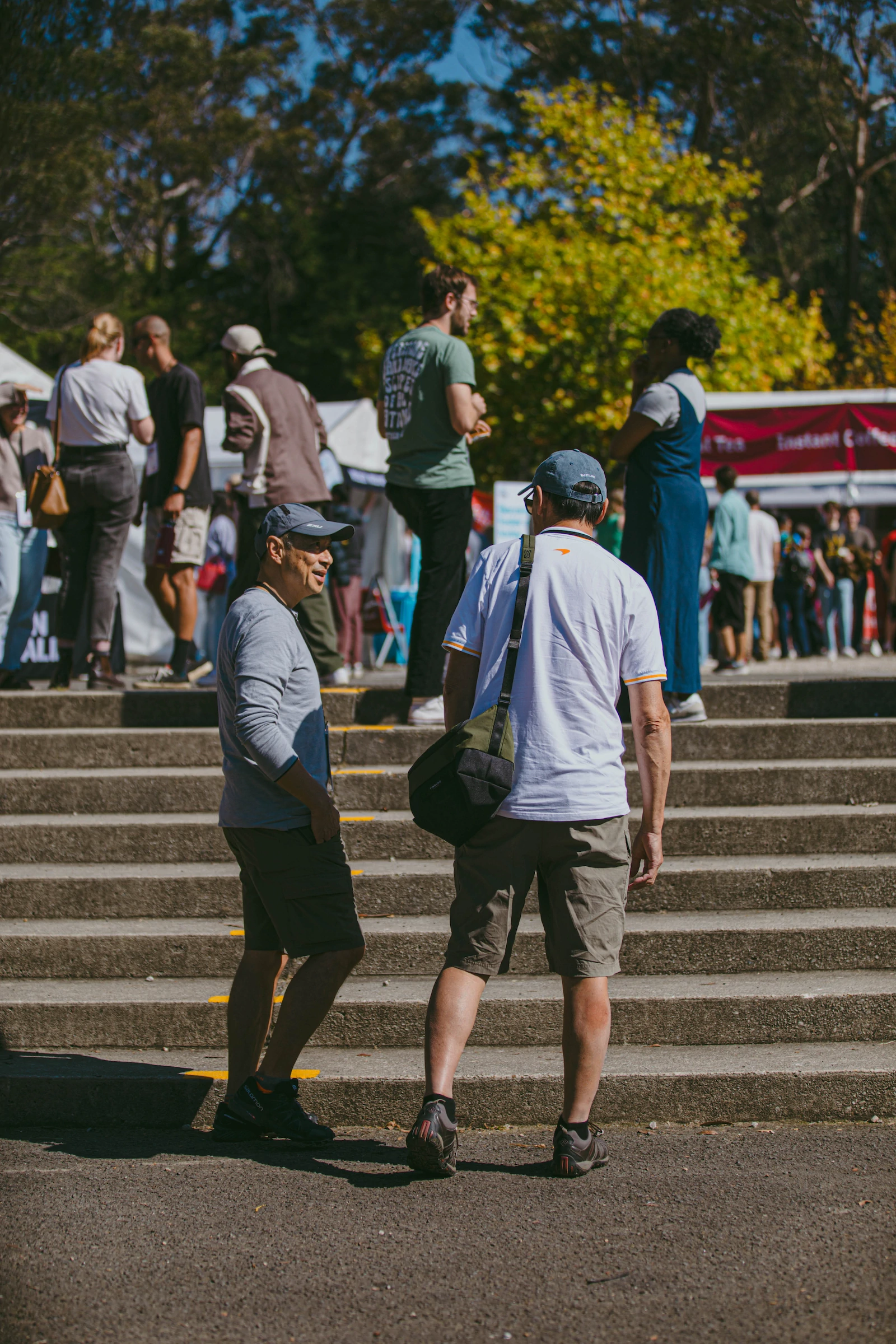 Conversation in the Plaza among the crowd at KEC 2024