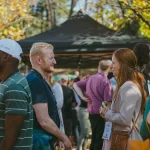 In conversation outside in the Plaza (thumbnail)