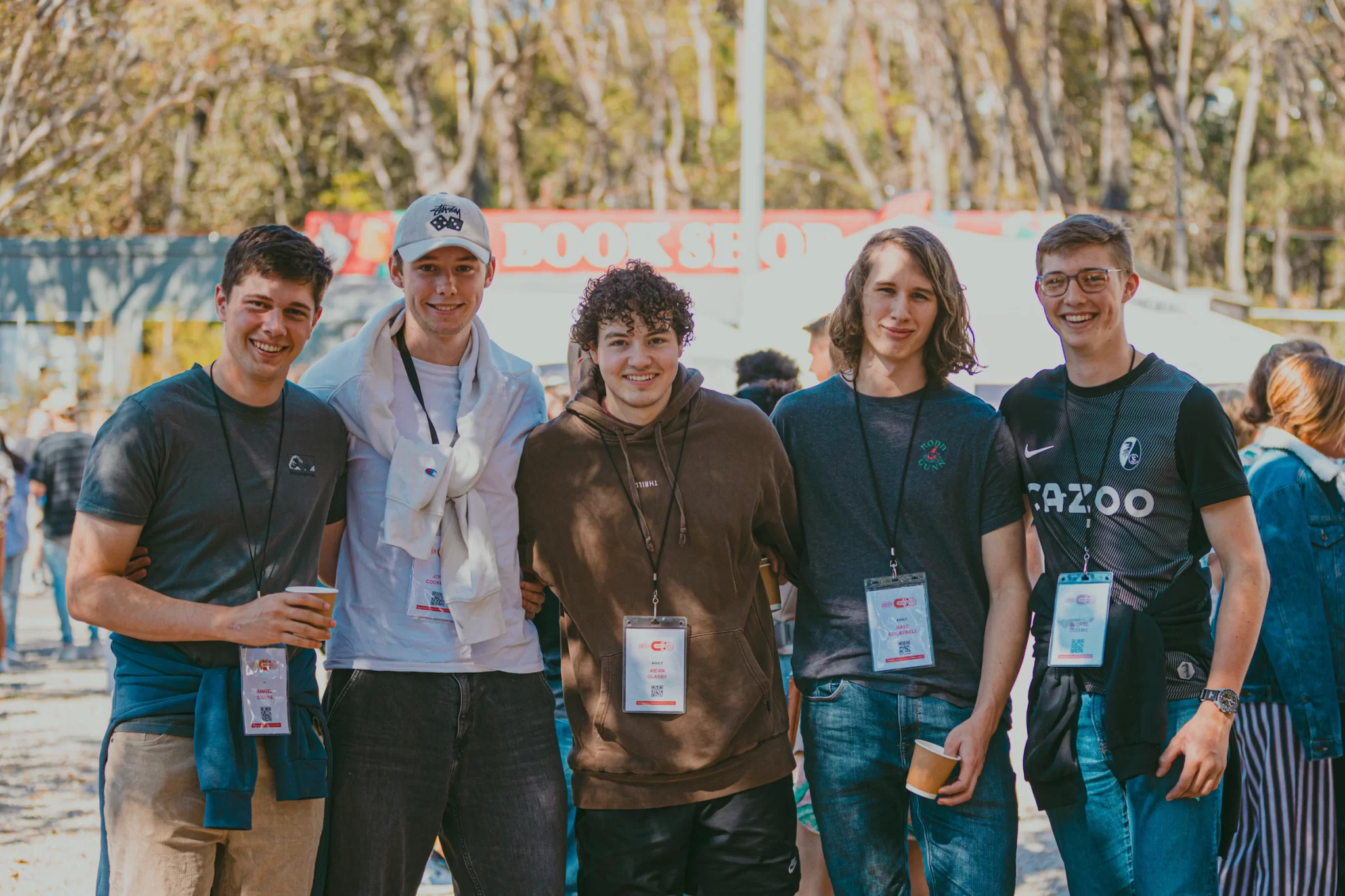 A group of young guys hanging out in the Plaza at KEC 2024